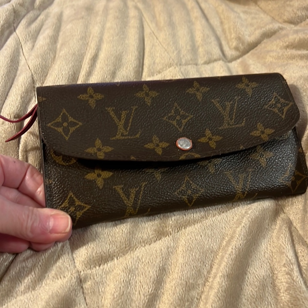 Original Louis Vuitton wallet . It has been well loved the serial # ca2143